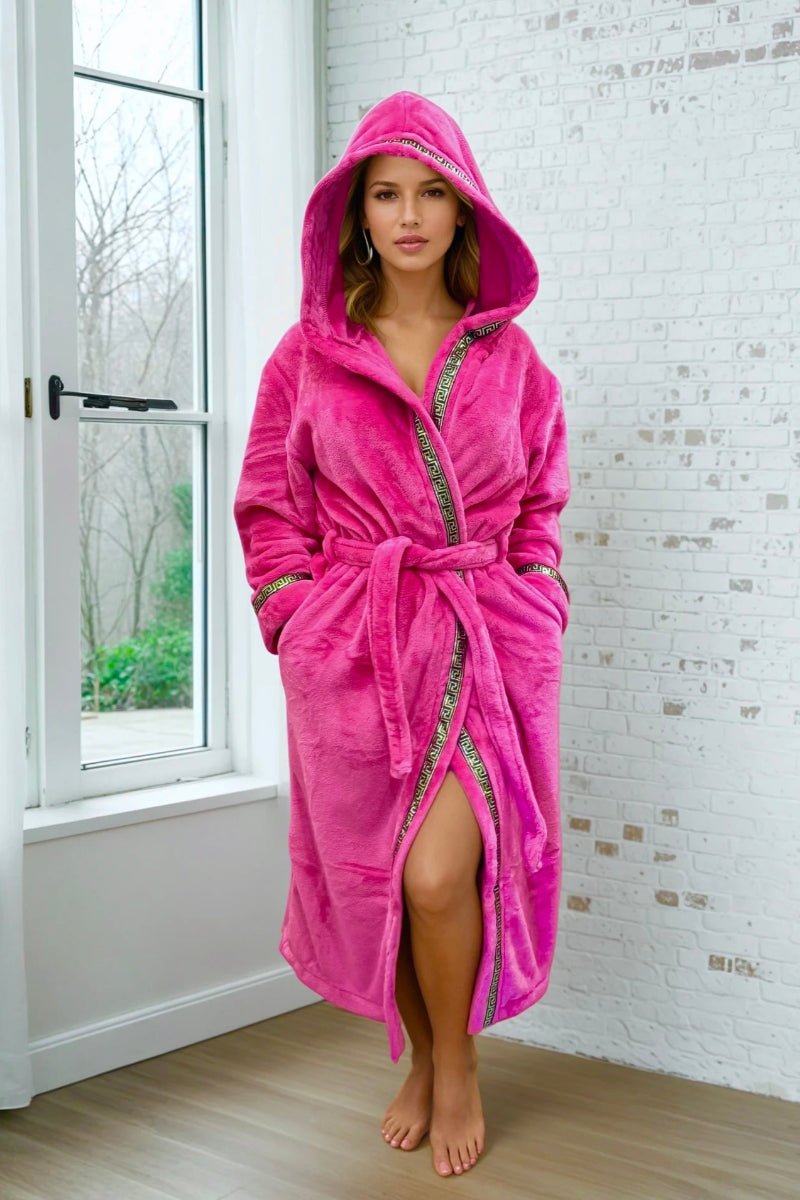 Pink Hooded Royalty Robe - Royalty Robes - model wearing a bright pink fuchsia bathrobe with gold Greek key trim and pockets.
