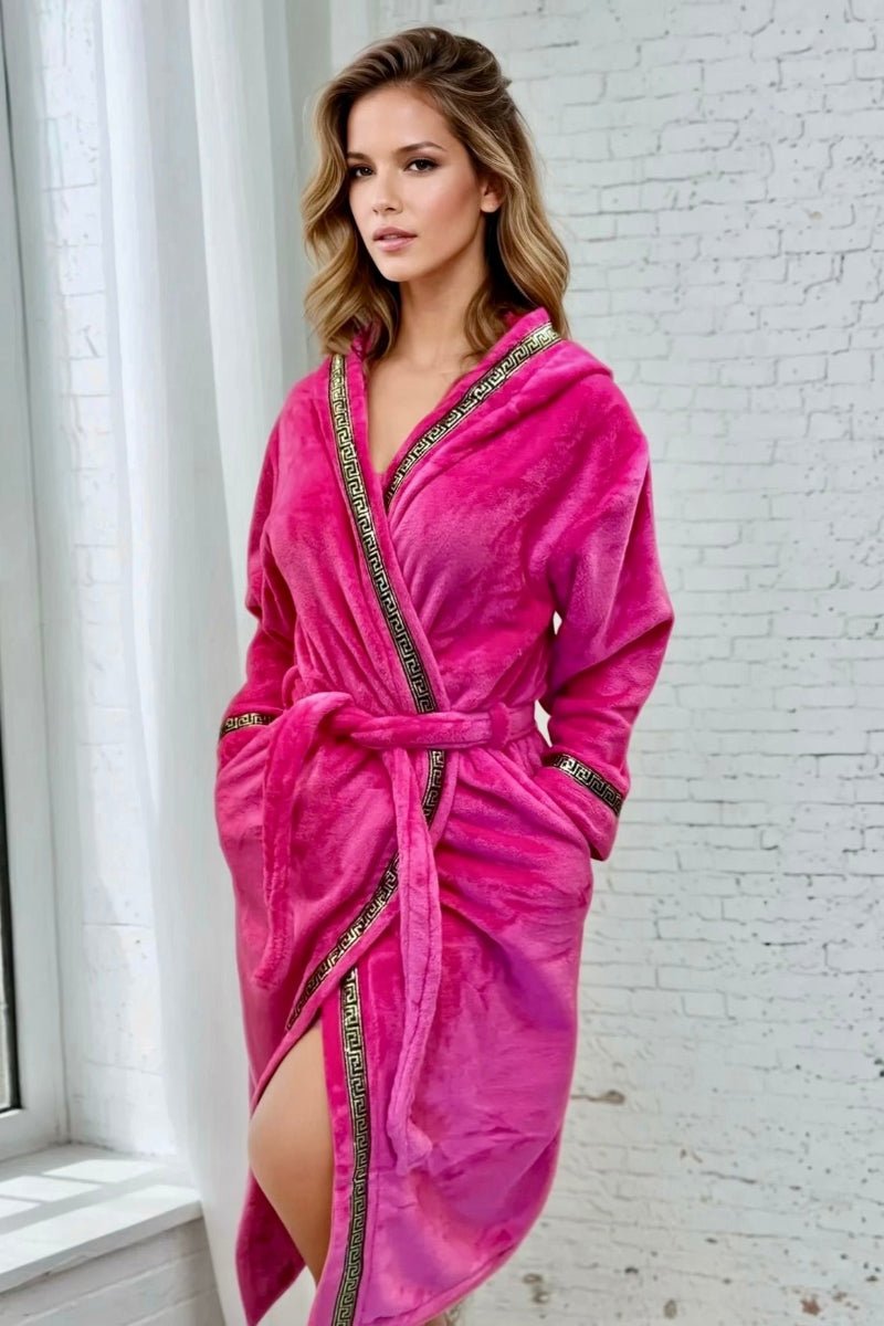 Pink Hooded Royalty Robe - Royalty Robes - model wearing a bright pink fuchsia bathrobe with gold Greek key trim and pockets.