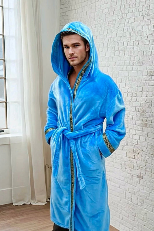 Sky Blue Royalty Robe - Royalty Robes - male model wearing a soft blue, long bathrobe with hood and gold Greek key trim and pockets.