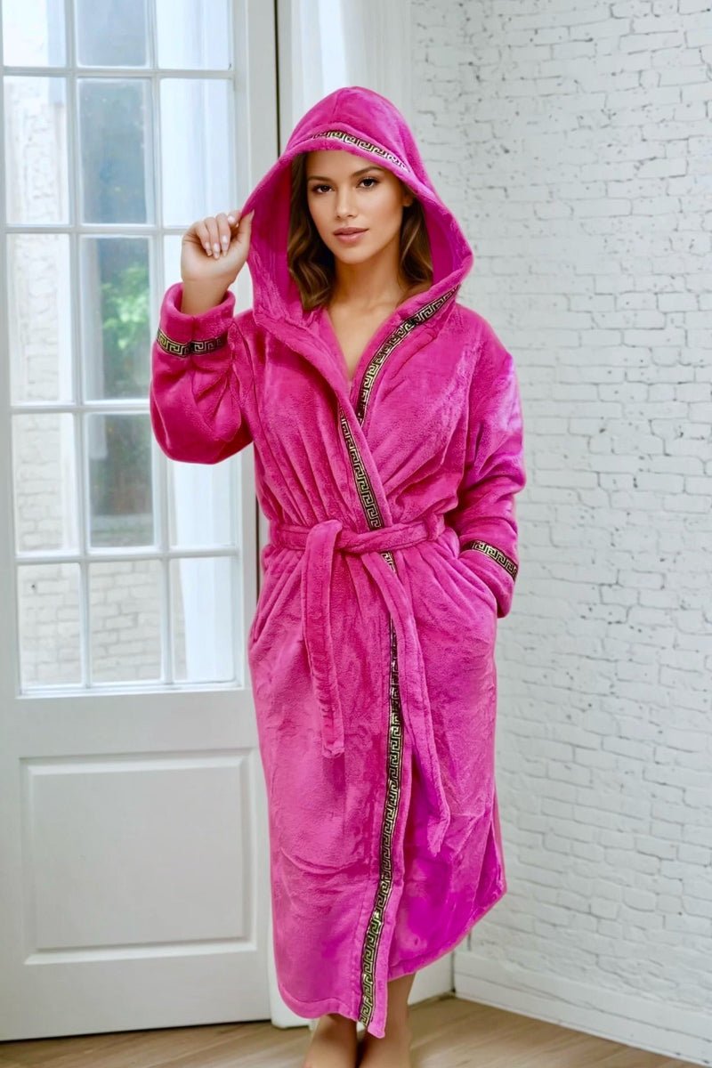 Pink Hooded Royalty Robe - Royalty Robes - model wearing a bright pink fuchsia bathrobe with gold Greek key trim and pockets.