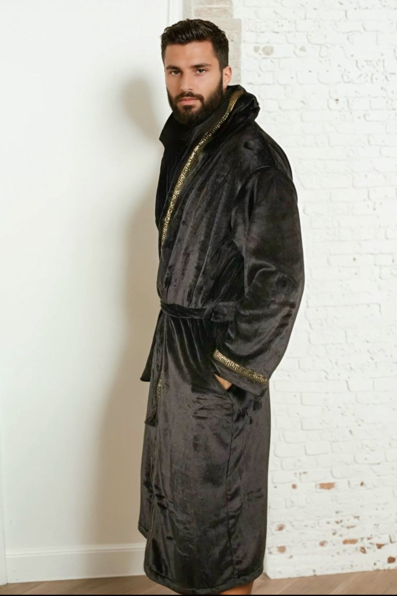 Man wearing black hooded Royalty Robe with gold Greek key trim. Soft fleece mens bathrobe with hood and pockets. Mens loungewear.