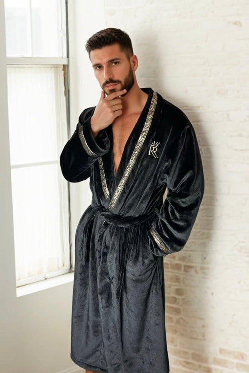 Black Royalty Robe - Royalty Robes - male male model wearing a black bathrobe with gold Greek key trim and pockets. Soft fleece mens robe.