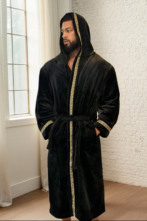Man wearing black hooded Royalty Robe with gold Greek key trim. Soft fleece mens bathrobe with hood and pockets. Mens loungewear.