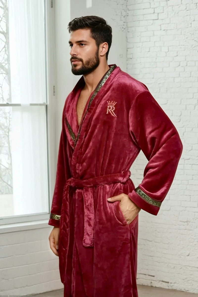 The Royal Burgundy Robe - Royalty Robes  Male model wearing a dark red robe with gold Greek key trim and pockets. Soft fleece mens sleep and loungewear.