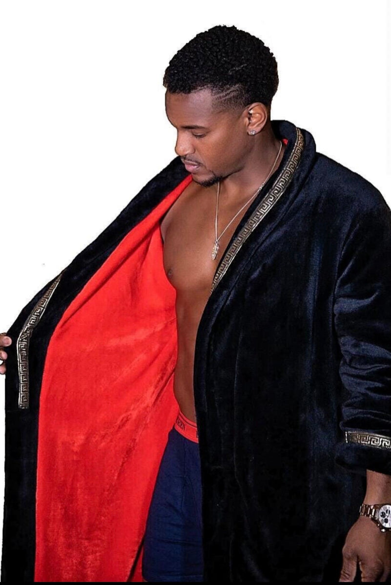 Royalty Robes Royal King robe - male model wearing black robe with red interior and gold Greek key trim. Soft fleece mens bathrobe, housecoat for men.
